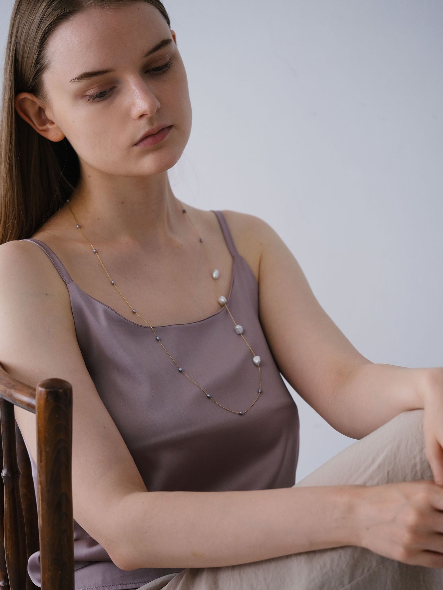 Decade Long Pearl Necklace