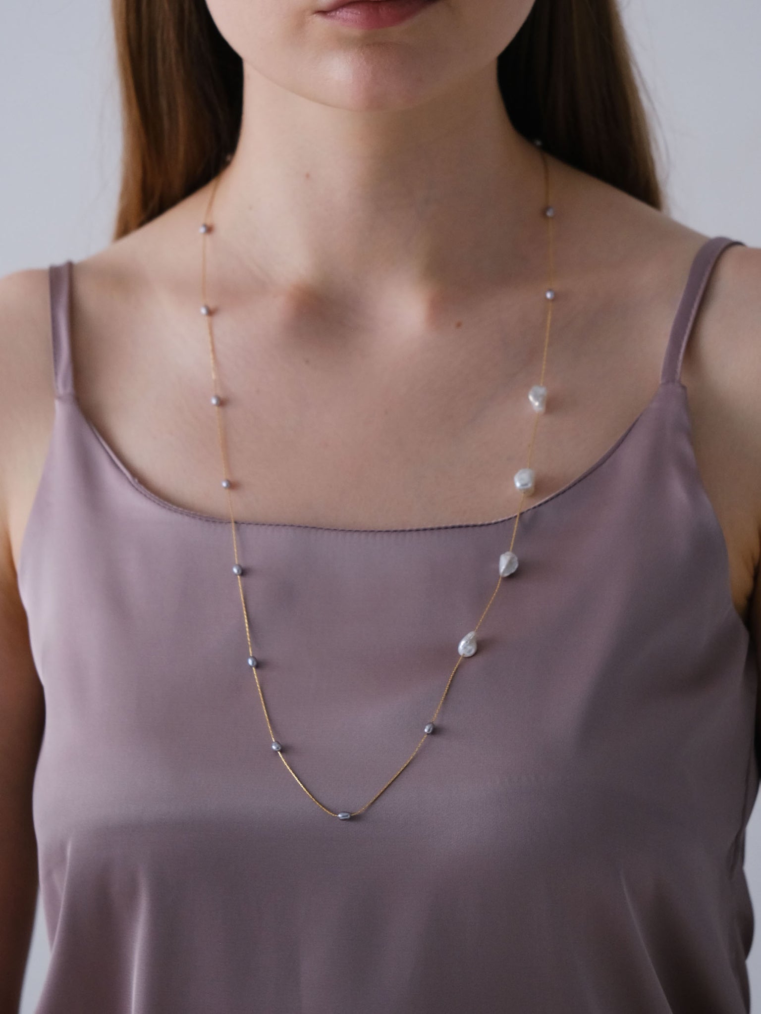 Decade Long Pearl Necklace