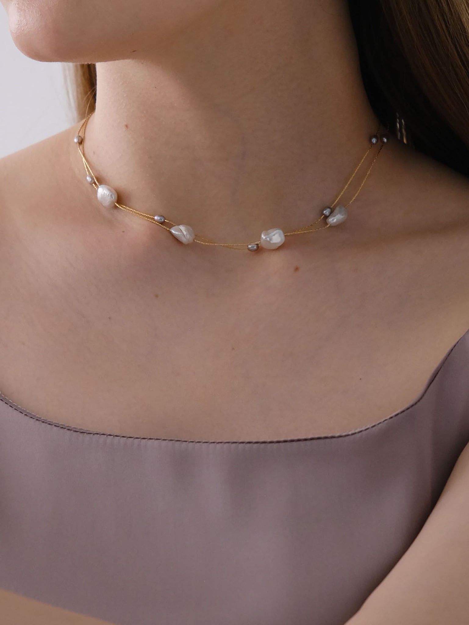 Decade Long Pearl Necklace