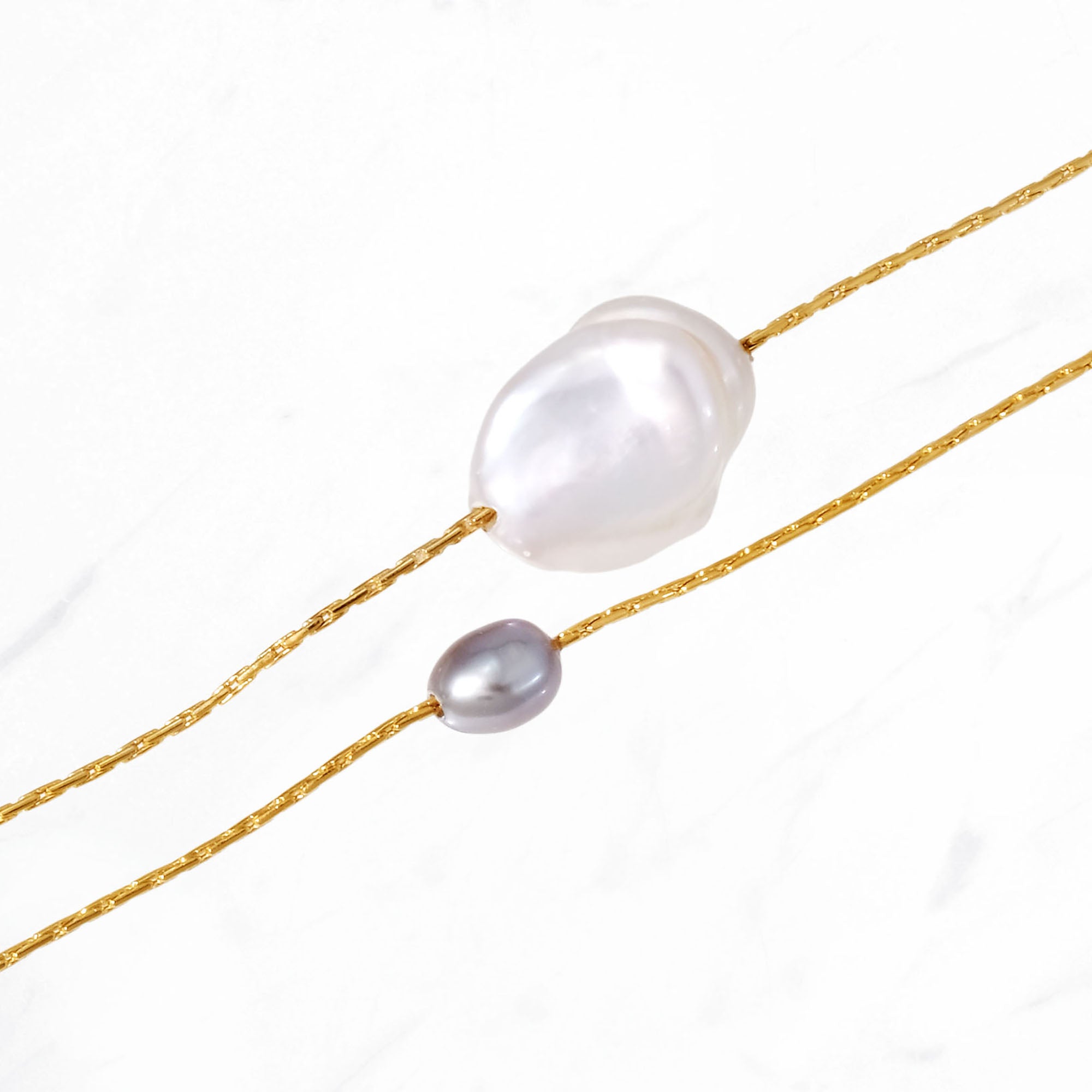 Decade Long Pearl Necklace